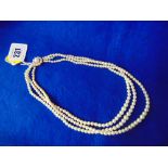 Three row graduated Pearl necklace with 9ct Gold clasp