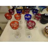 Twelve Bohemian overlay coloured wine glasses