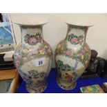 A pair of small Canton style vases