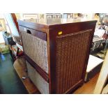 A Mahogany and rattan two drawer cabinet