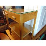 A small glass top table