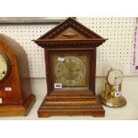 A brass framed mantle clock