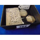 An early 20th century Silver 800 pill box embossed scenes depicting early rural life,