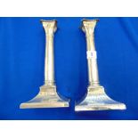 A pair of hallmarked Silver candlesticks