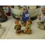 Three Goebel's figurines inc.