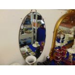 An Oval wall mirror