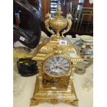 A French gilt over mantle clock