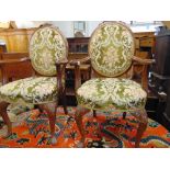 An Oval Mahogany dining table and five chairs,