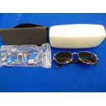 Two replica designer sunglasses