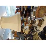 A large onyx and brass table lamp