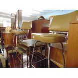 A pair of leather and chrome bar stools