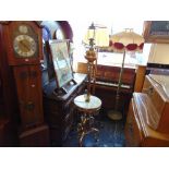 A brass and onyx standard lamp/ occasional table