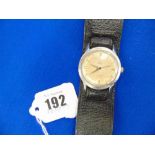 A mid-century stainless steel watch,