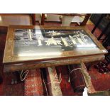 A lacquered oriental coffee table