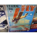 A Vintage 'Learn to fly' metal poster, 40.