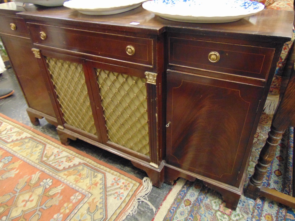 A Regency style Mahogany table and chairs