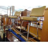 A pair of leather and chrome bar stools