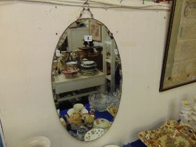 An Oval wall mirror