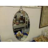 An Oval wall mirror