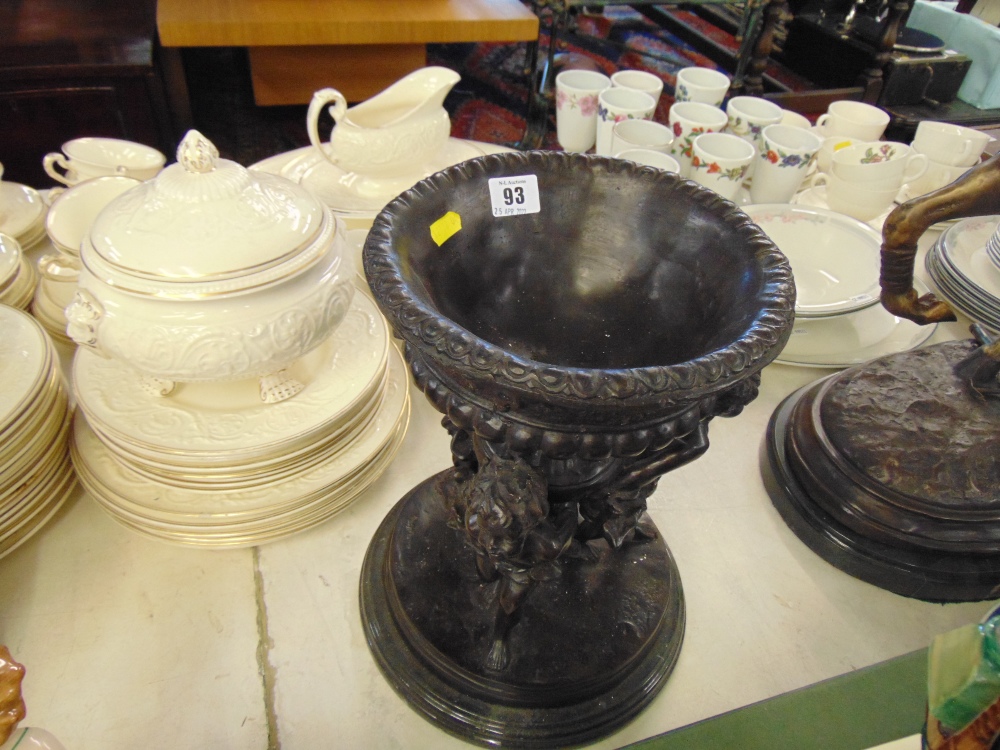 A bronze bowl with cherubs