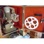 A cased Cine projector