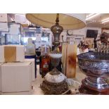 A large onyx and brass table lamp