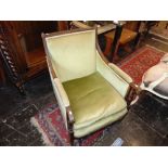 A Green upholstered fireside chair