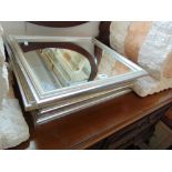 Five small silver framed mirrors