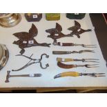 A cast Iron group of flying Ducks, and some bone handled tools etc.