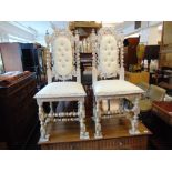 A pair of White painted hall chairs