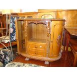 A bow fronted cabinet, two drawers,