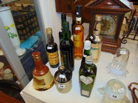 Nine bottles alcohol; Port, Sherry, Bells, Harvey's,