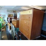 A retro five drawer chest and a dressing table