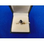 An 18ct gold, Diamond and Sapphire ring,