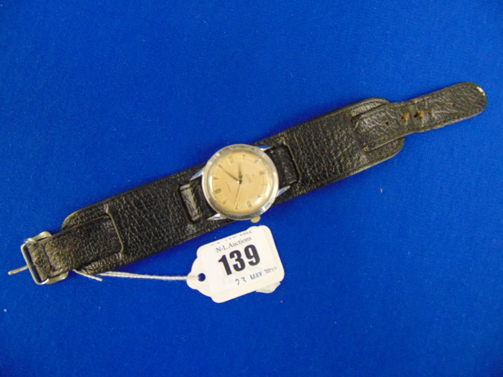 A mid-century stainless steel watch,