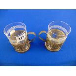 A pair of foreign marked Silver tea glass holders,