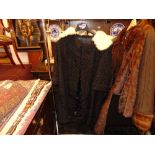 A Black Persian Lambs wool, White Mink collar, silk linen,