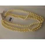 A set of three Pearl necklaces,