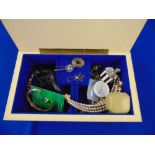 A small qty of costume jewellery in box. inc.