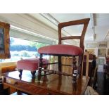 A Pink upholstered chair and foot stool