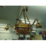 A brass and alabaster three branch light fitting