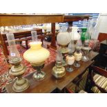 Nine assorted oil lamps