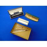 A qty of assorted Silver, Gold plated propelling pencils etc,
