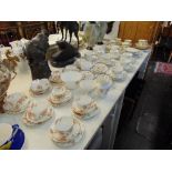 A floral pattern tea set plus others including some Crown Derby