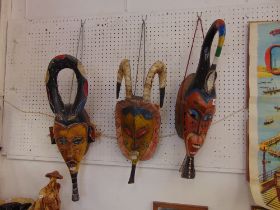 Three African wall masks