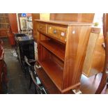 A Dwarf bookcase with two drawers