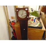 An Artdeco Oak Grandmother clock a.