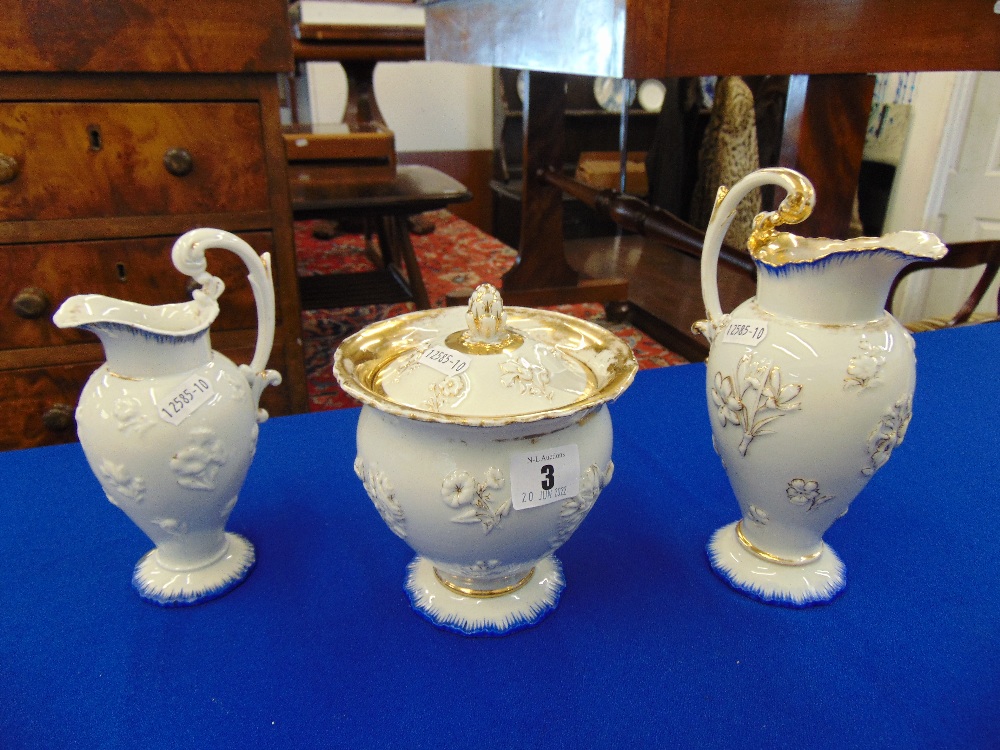 A qty of Meissen, two jugs and a lidded bowl, some wear a.