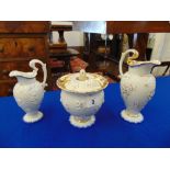 A qty of Meissen, two jugs and a lidded bowl, some wear a.
