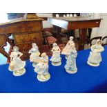 A collection of seven Royal Worcester lady figures